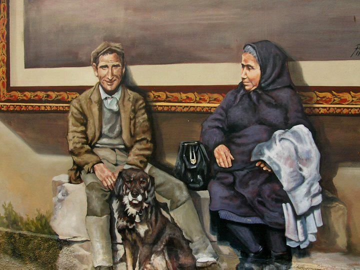 Murale di Pina Monne con una coppia e un cane