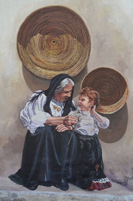 Murale di Pina Monne con una donna anziana e una bambina